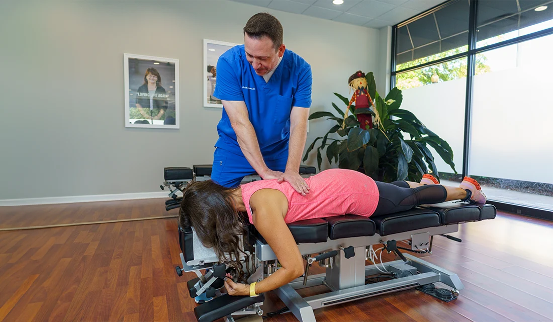 Chiropractor Columbus GA David Johnson Adjusting Patients Back